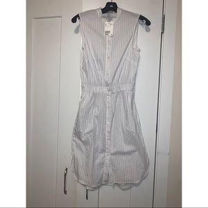 Beautiful knee length dress brand new with tag.